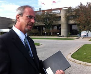Randy Hope outside the Chatham courthouse in 2013